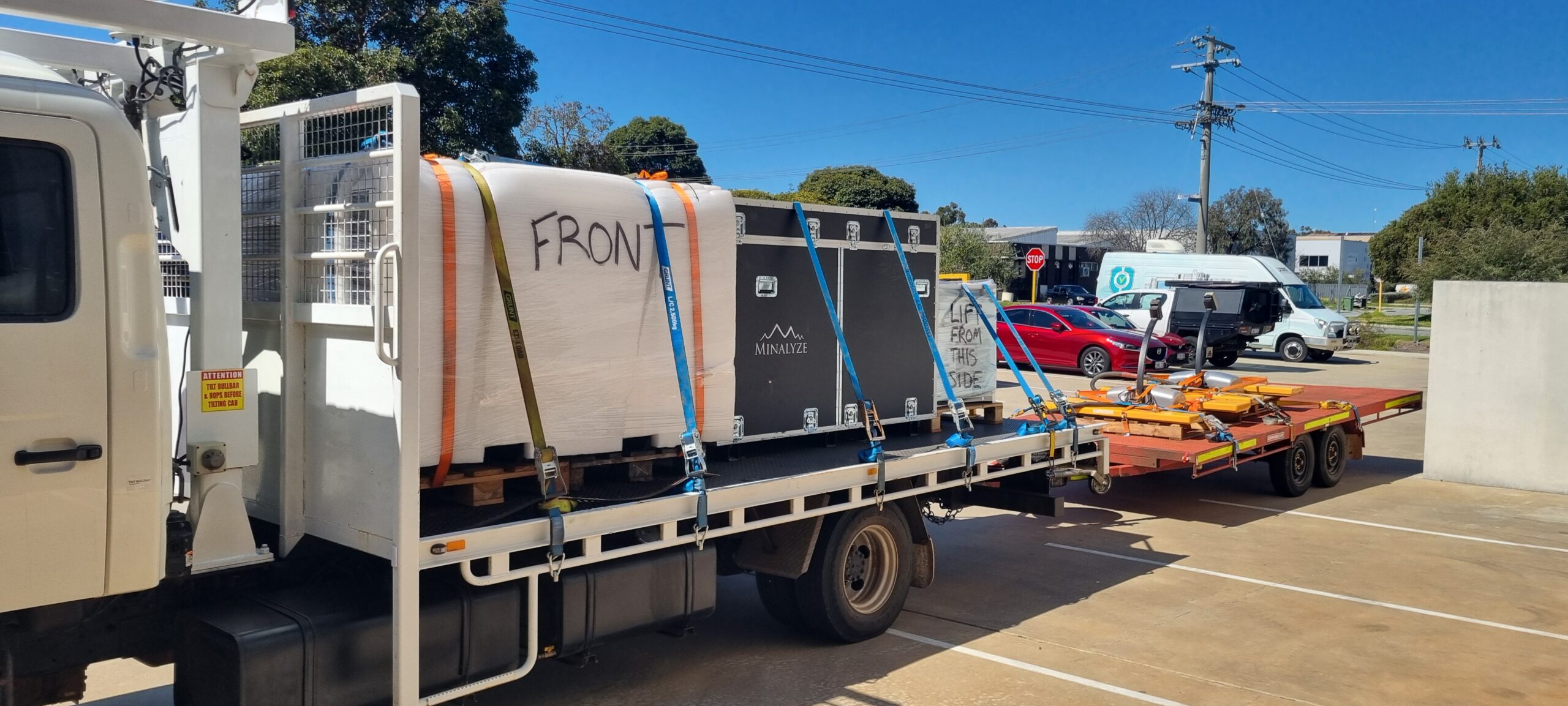 Hotshot truck unloading multi-million dollar freight in Perth WA
